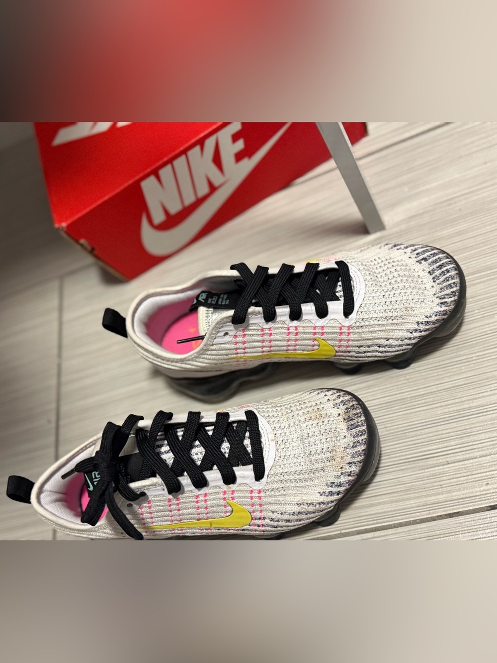 Nike White Knit Kids Sneakers with Pink Accents and Yellow Swoosh